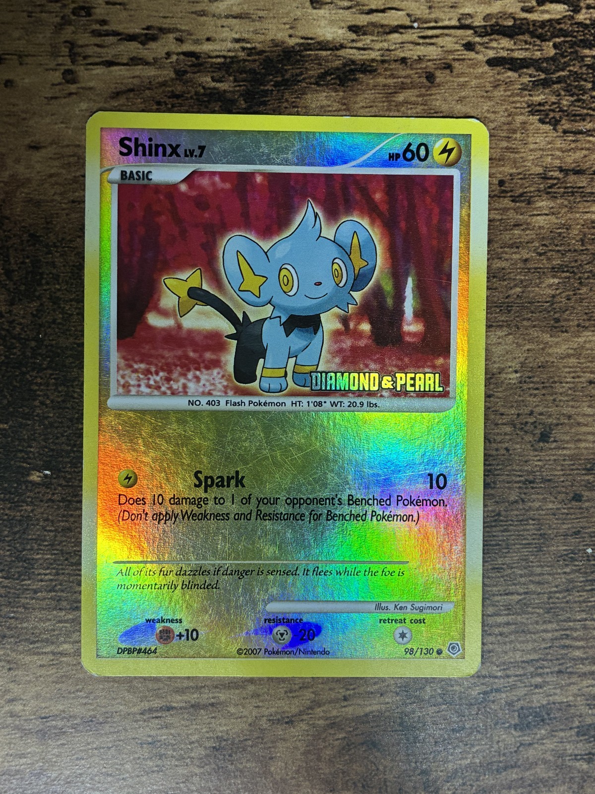 Shinx 98/130 Diamond and Pearl Reverse Holo Stamped Pokemon Card 2007 dmg