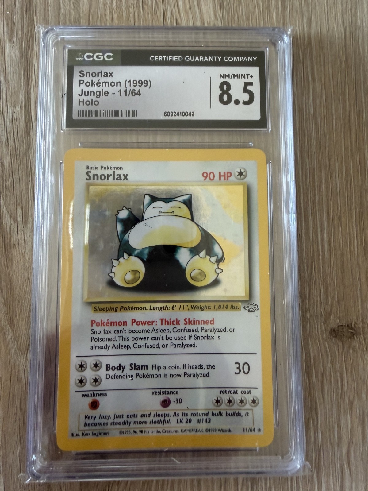 Pokémon Snorlax 11/64 Jungle Holo – CGC 8.5 NM/Mint