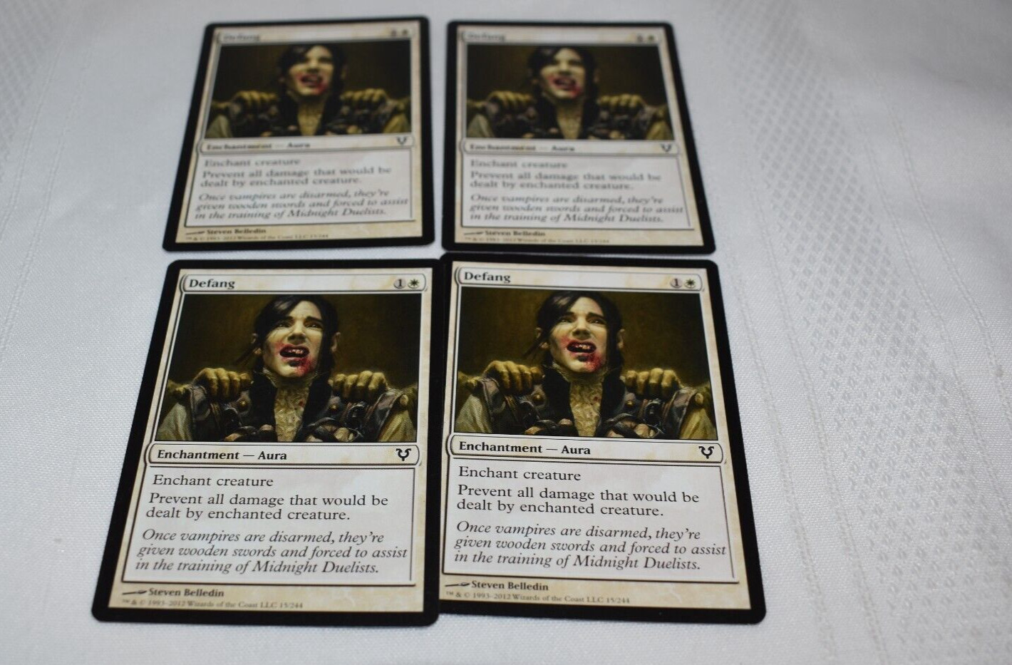 Magic card: 4x Defang White Common Enchantment Aura 2012 Steven Belledin