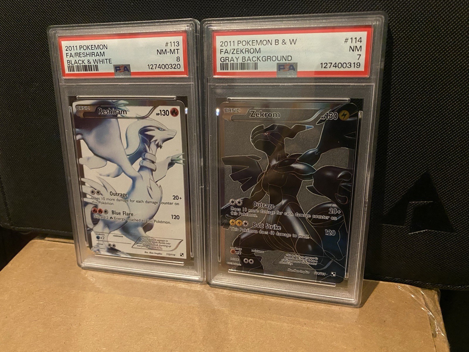 PSA 8/7 NM-MT Reshiram #113 & Zekrom #114 2011 Black & White Set