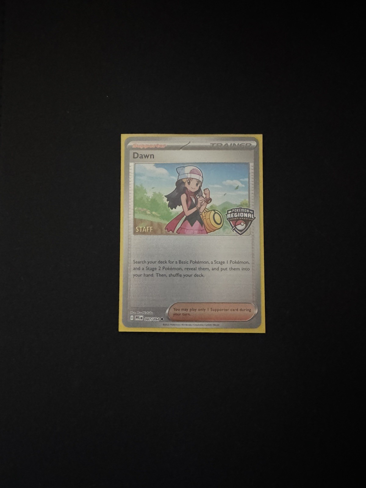 Dawn Trainer-Supporter STAFF Holo Promo 087/094 English 2025 Regionals