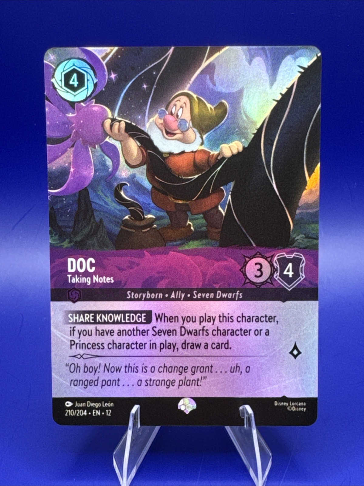 Doc – Taking Notes – 210/204 – Epic – Holofoil Lorcana DLC12 Wilds Unknown