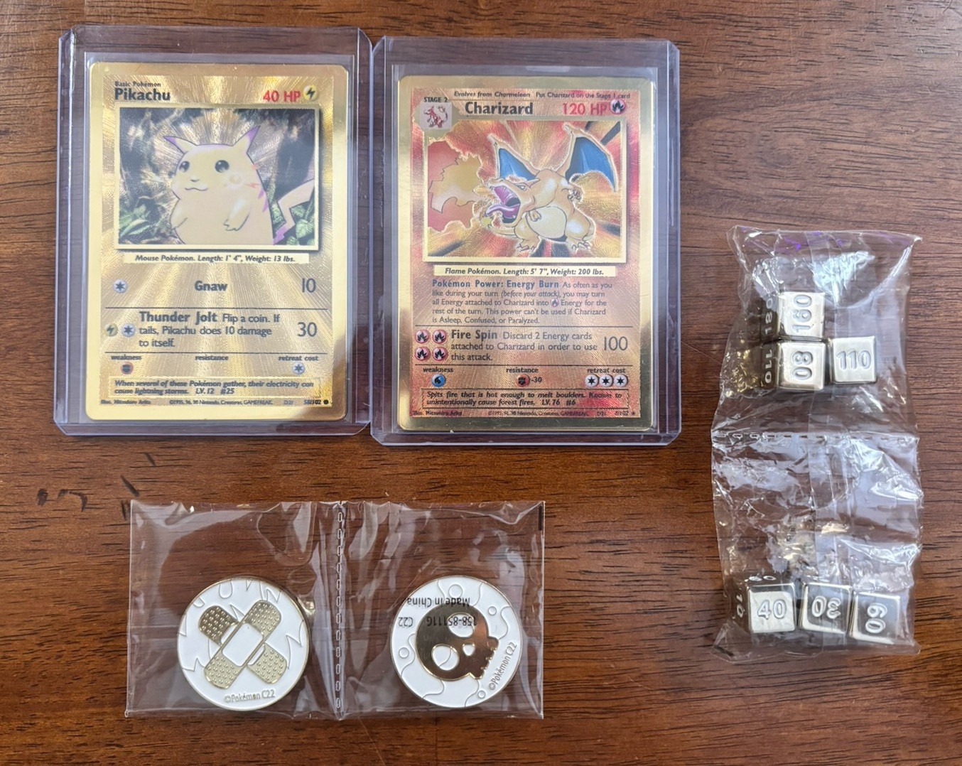 Charizard and Pikachu 25th Celebrations UPC Gold Metal Cards