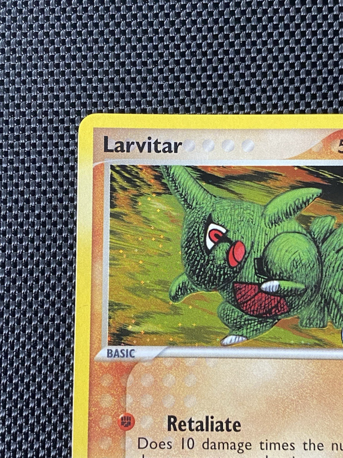 Larvitar 61/115 Unseen Forces (Stamped) Reverse Holo LP+
