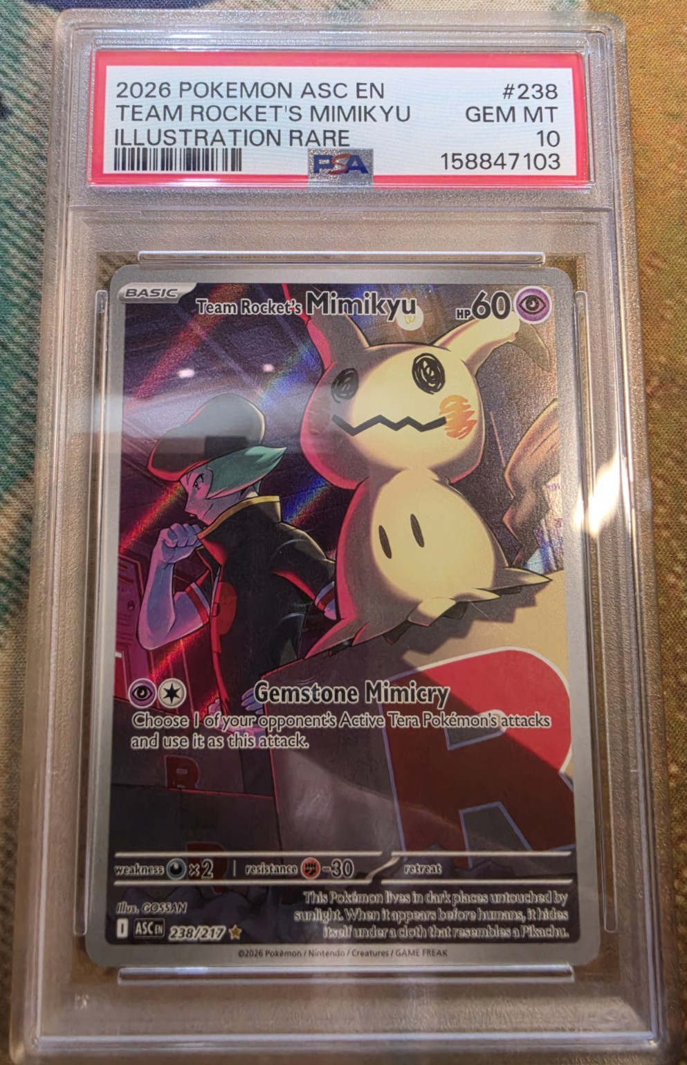 Team Rocket’s Mimikyu 238/217 Illustration Rare Holo PSA 10 EN