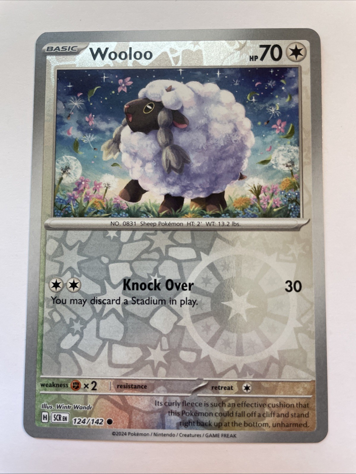 Wooloo 124/142 – Sv07: Stellar Crown Reverse Holo (NM)