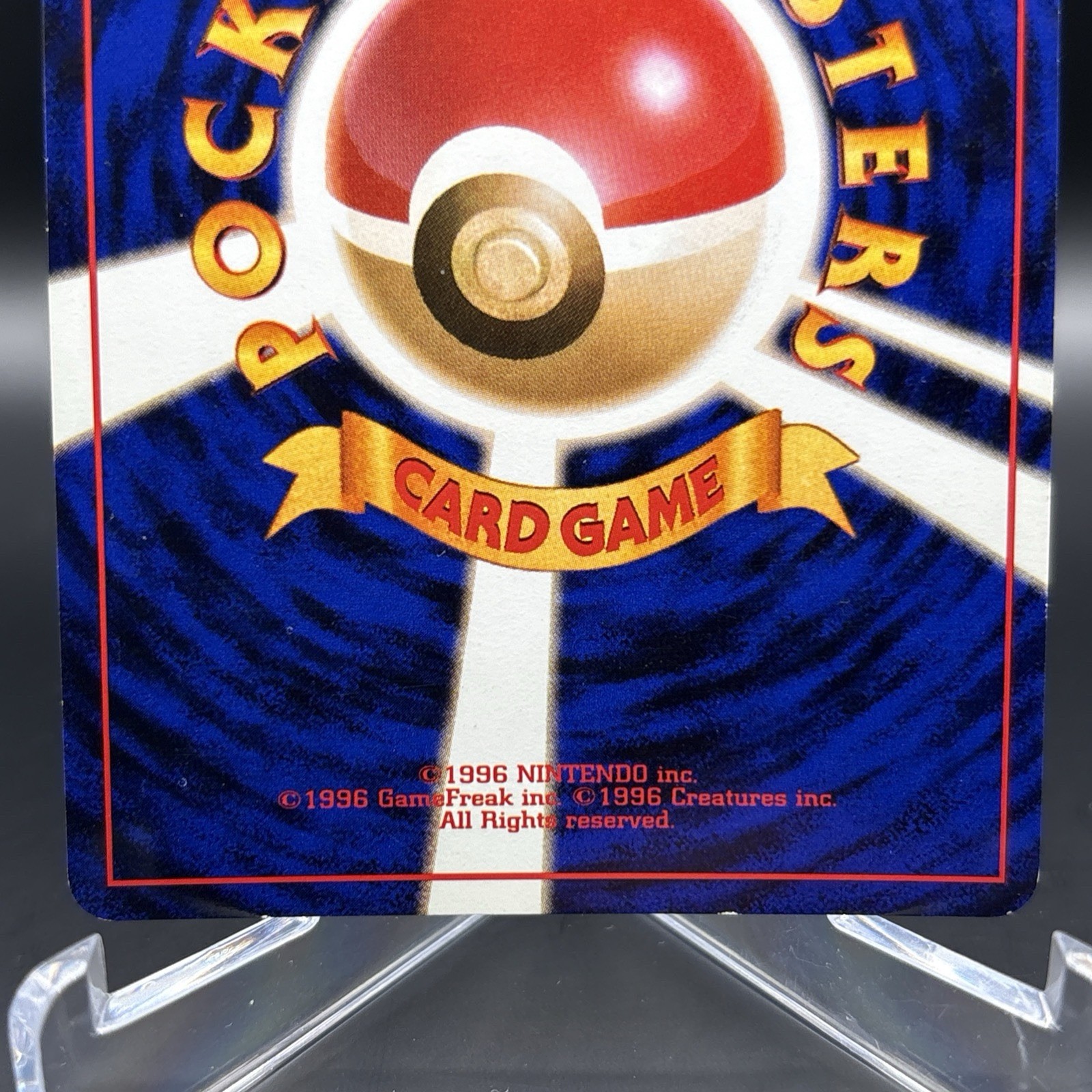 1997 Pokémon Japanese Rocket Gang Holo #24 – DARK ARBOK half swirl (read Below)