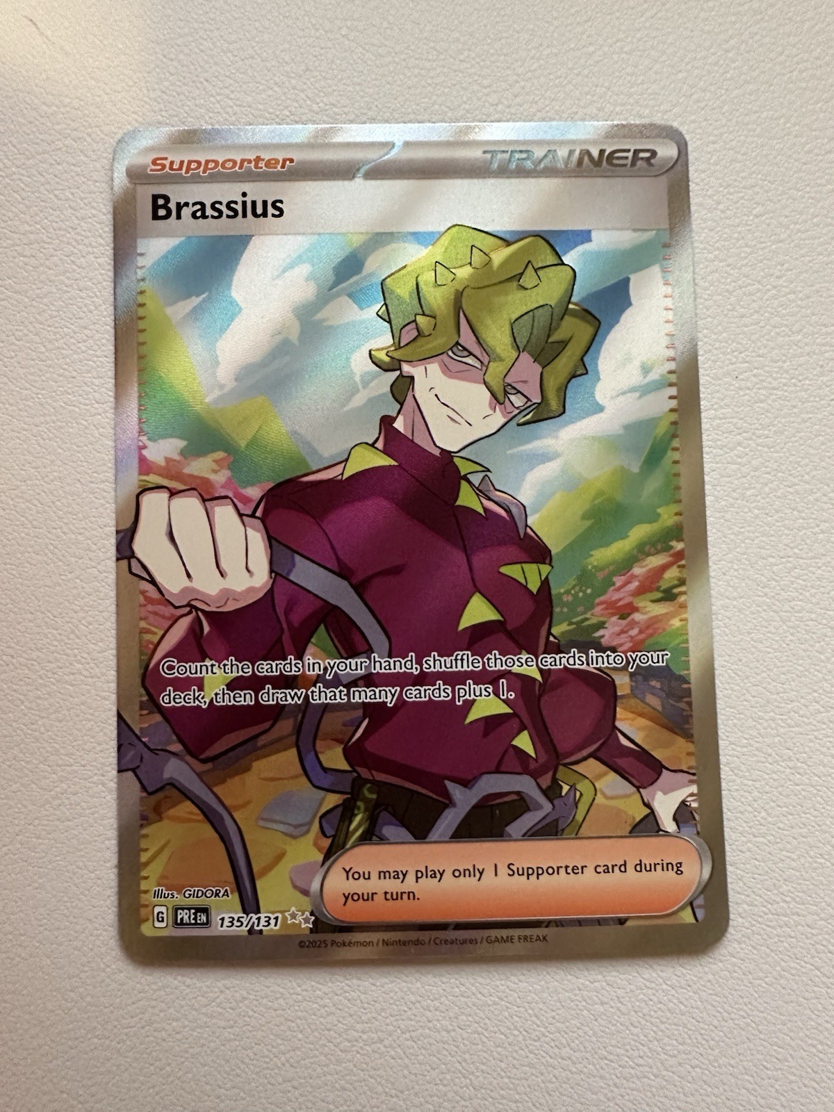 Brassius 135/131 Prismatic Evolutions Holo