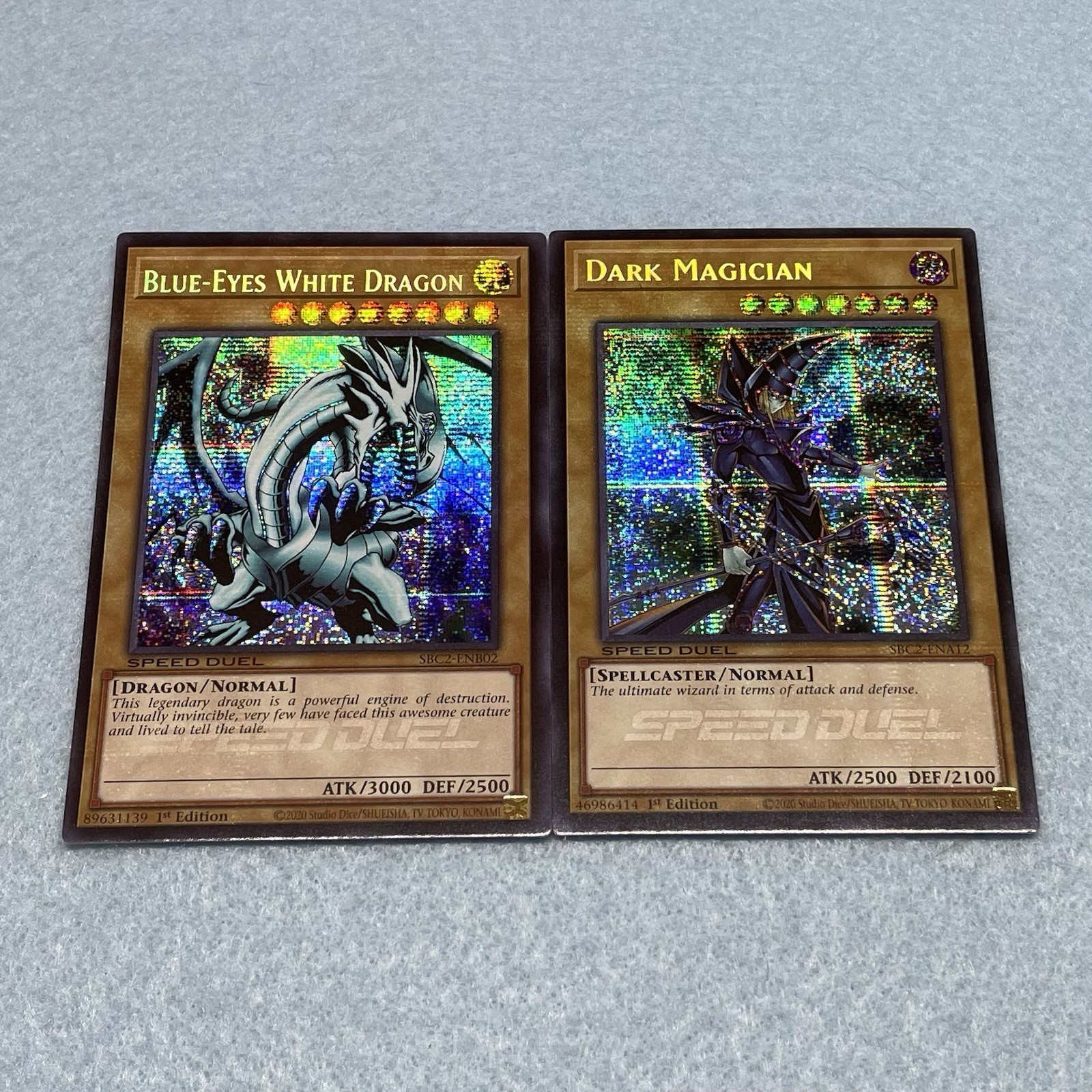 Yugioh Blue Eyes White Dragon + Dark Magician SBC2 1st Ed Secret Rare Light Play