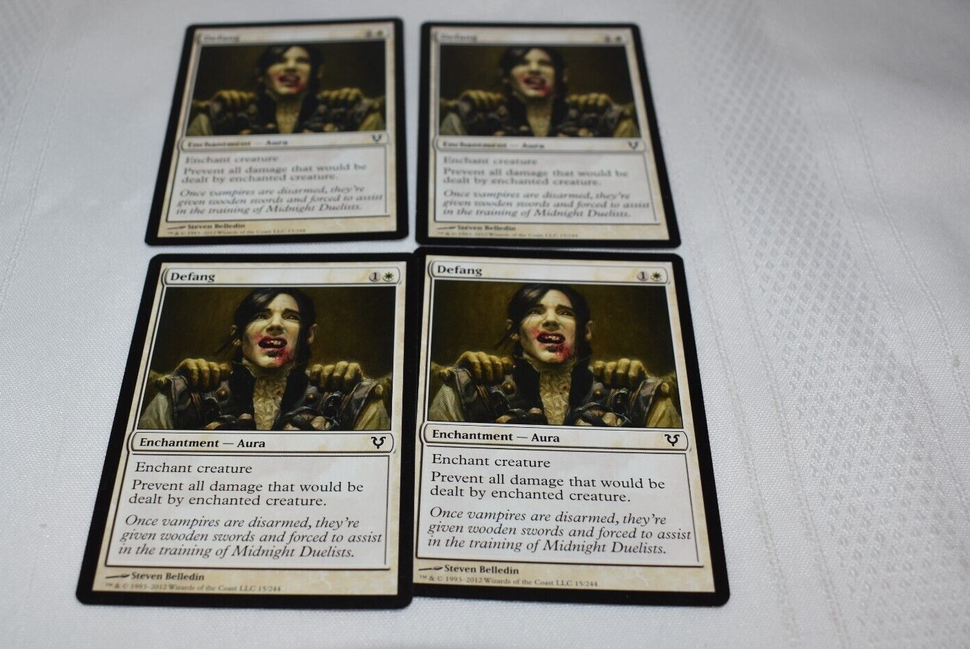 Magic card: 4x Defang White Common Enchantment Aura 2012 Steven Belledin