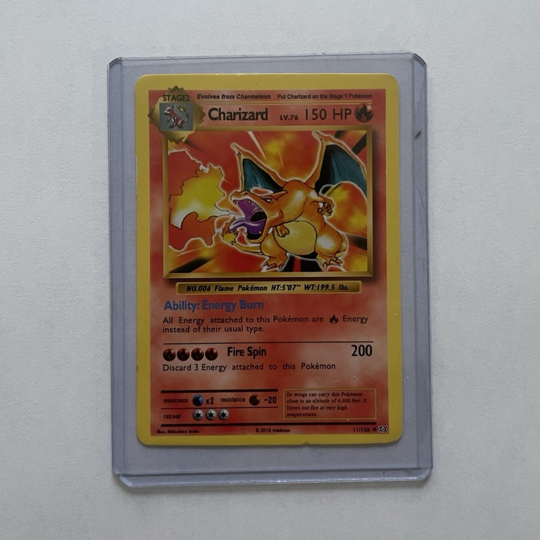 The Pokémon Company Charizard 11/108 Evolutions 2016 Holo Rare English 150HP