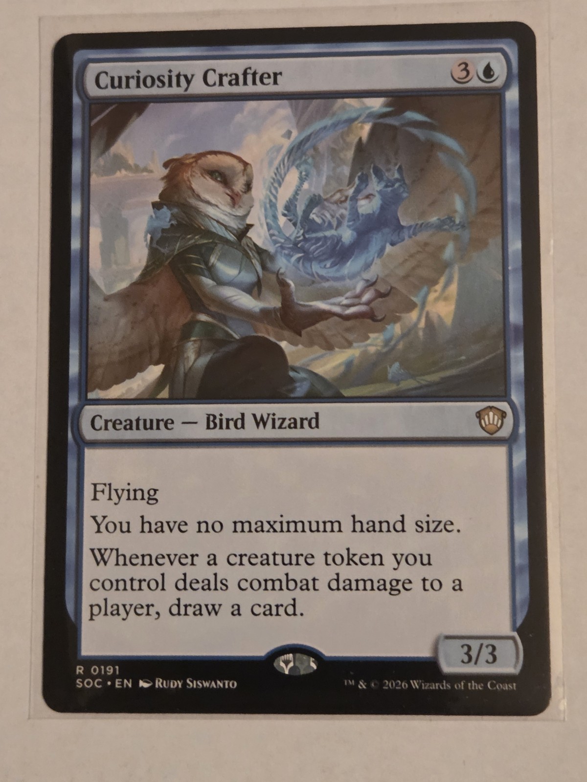 Curiosity Crafter Commander: Secrets of Strixhaven Regular