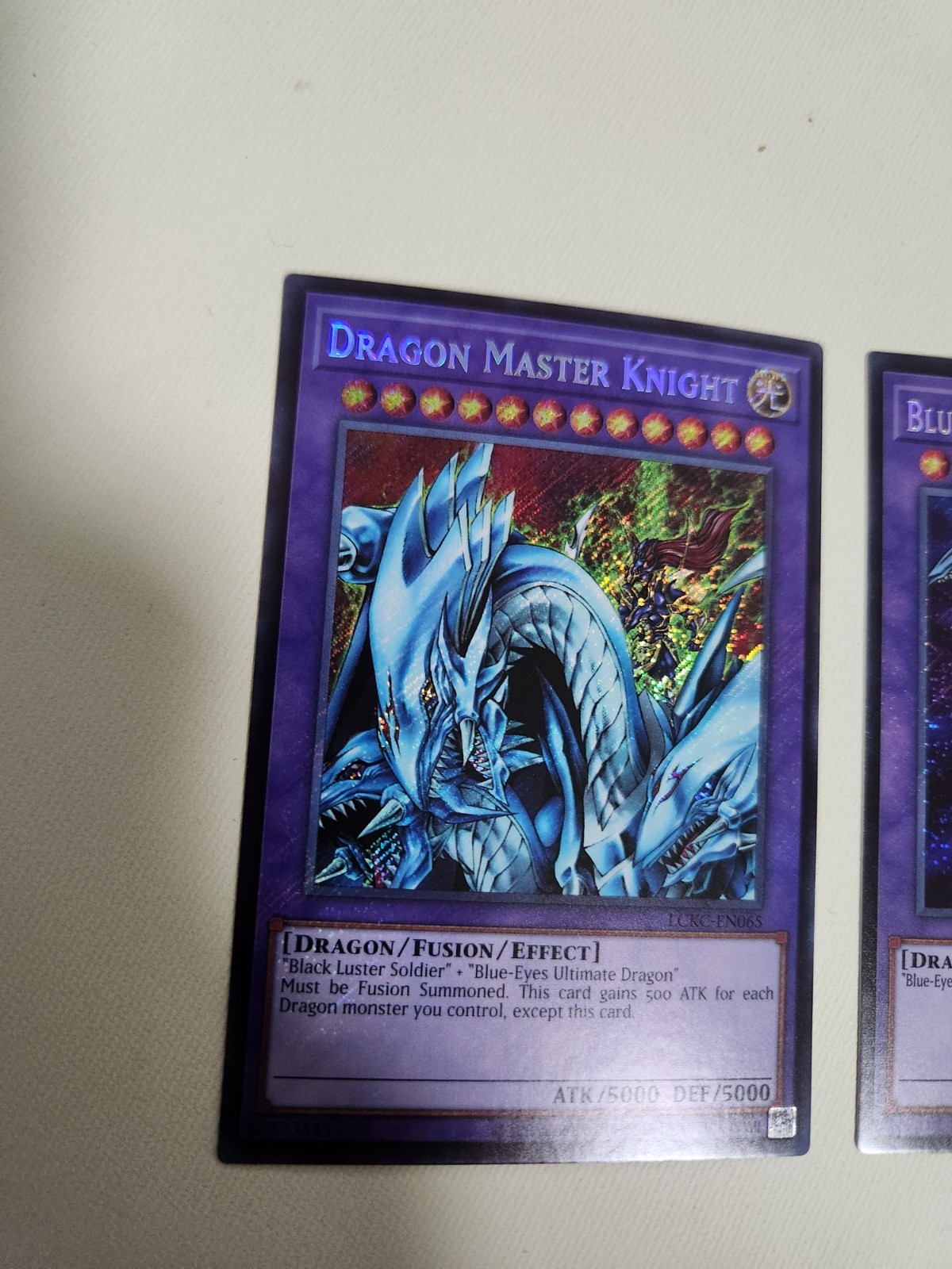 Yugioh 2x Set/ Dragon Master Knight + Ultimate Dragon/ Secret Rares LCKC NM/MINT