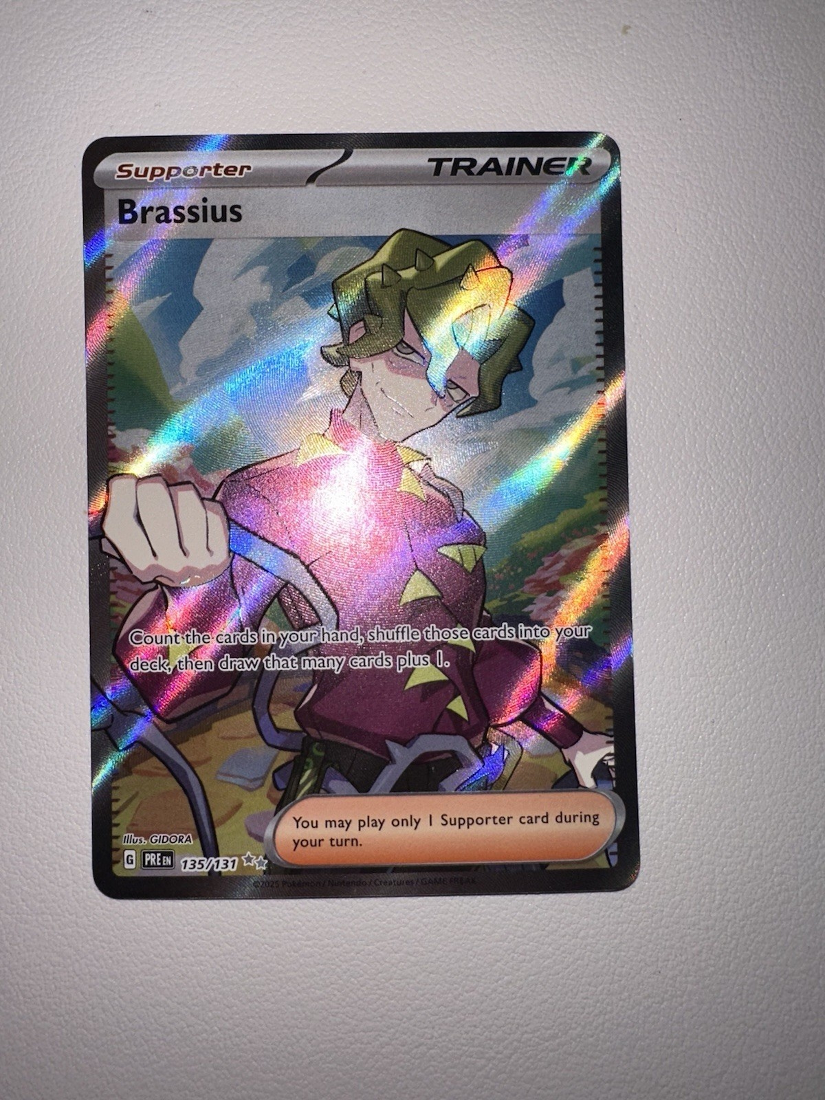 Brassius 135/131 Prismatic Evolutions Holo