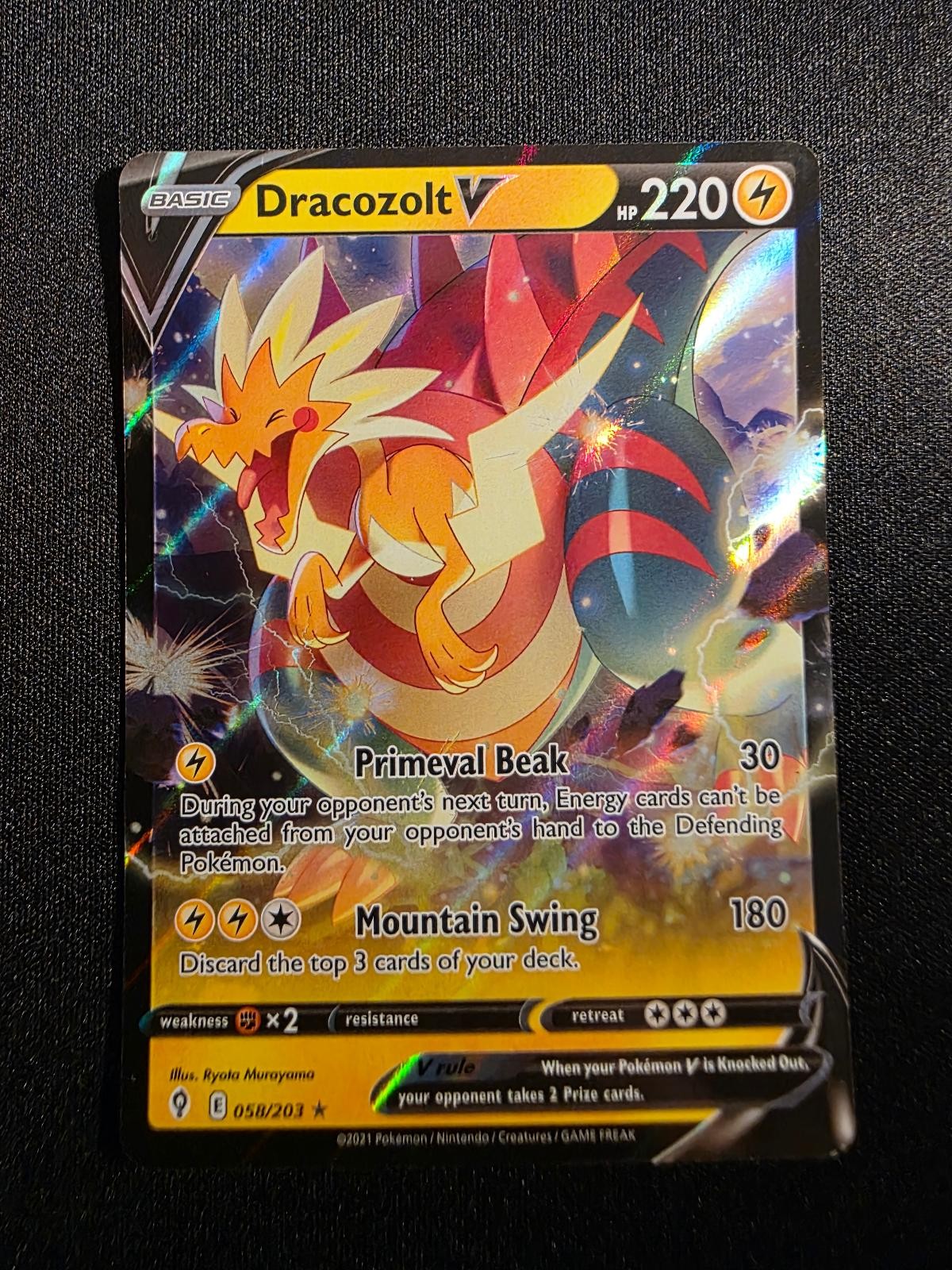 Dracozolt V 058/203 Evolving Skies V Rare Holo Near Mint
