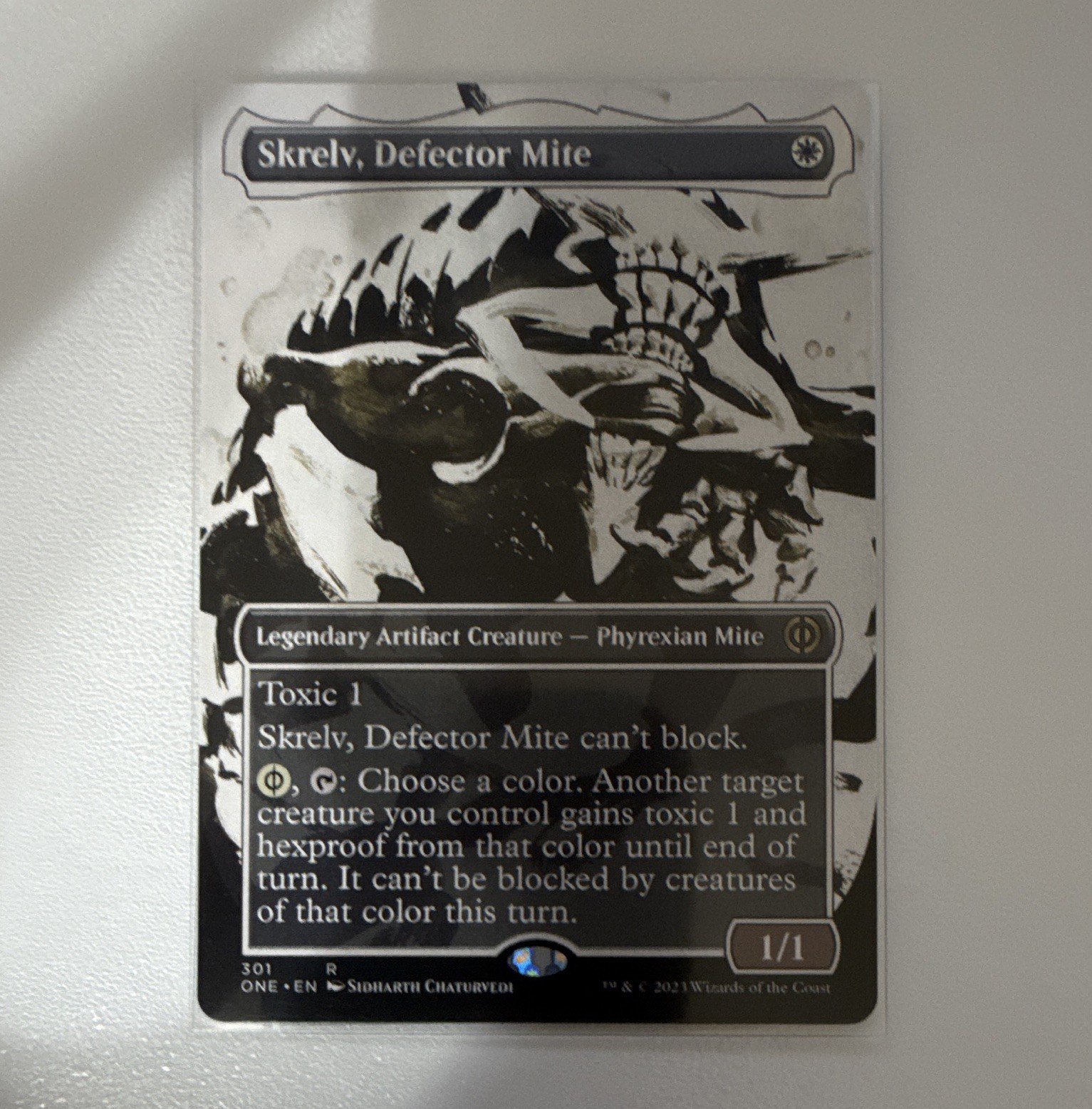 Wizards of the Coast MTG Skrelv, Defector Mite 301 Rare Showcase Regular English