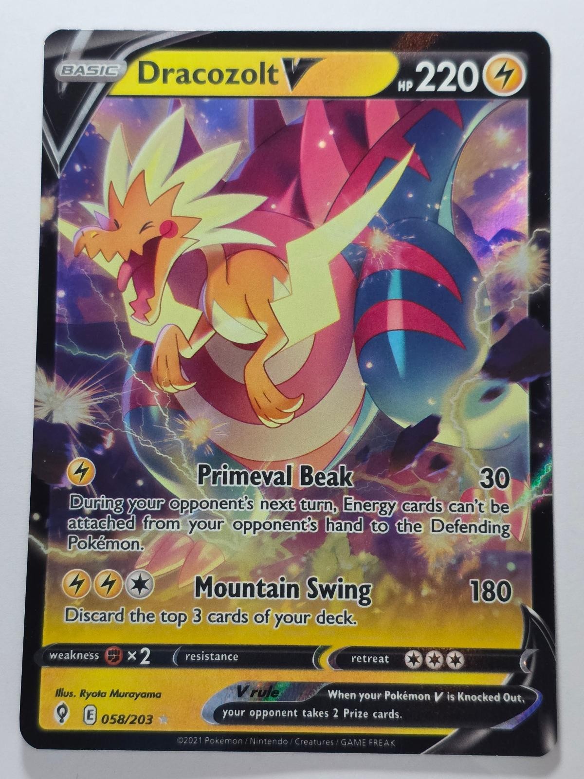 DRACOZOLT V 058/203 HOLO V RARE EVOLVING SKIES NM/M POKEMON