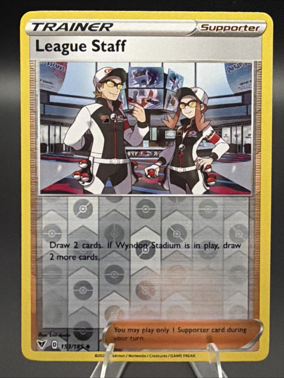 League Staff 153/185 Swsh04: Vivid Voltage Reverse Holo