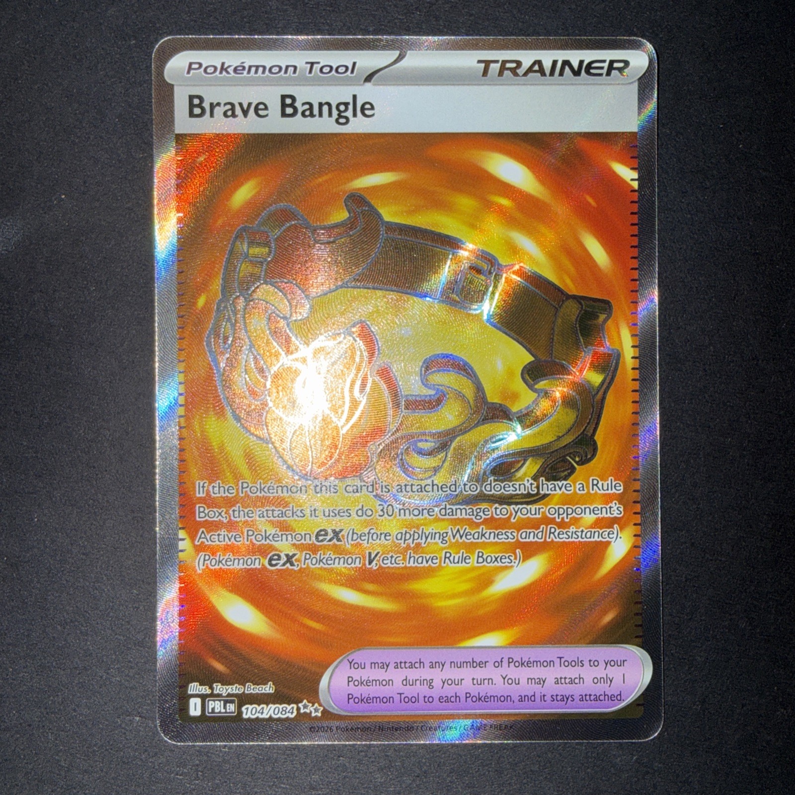 The Pokémon Company Brave Bangle 104/084 Pitch Black Full Art Trainer Tool