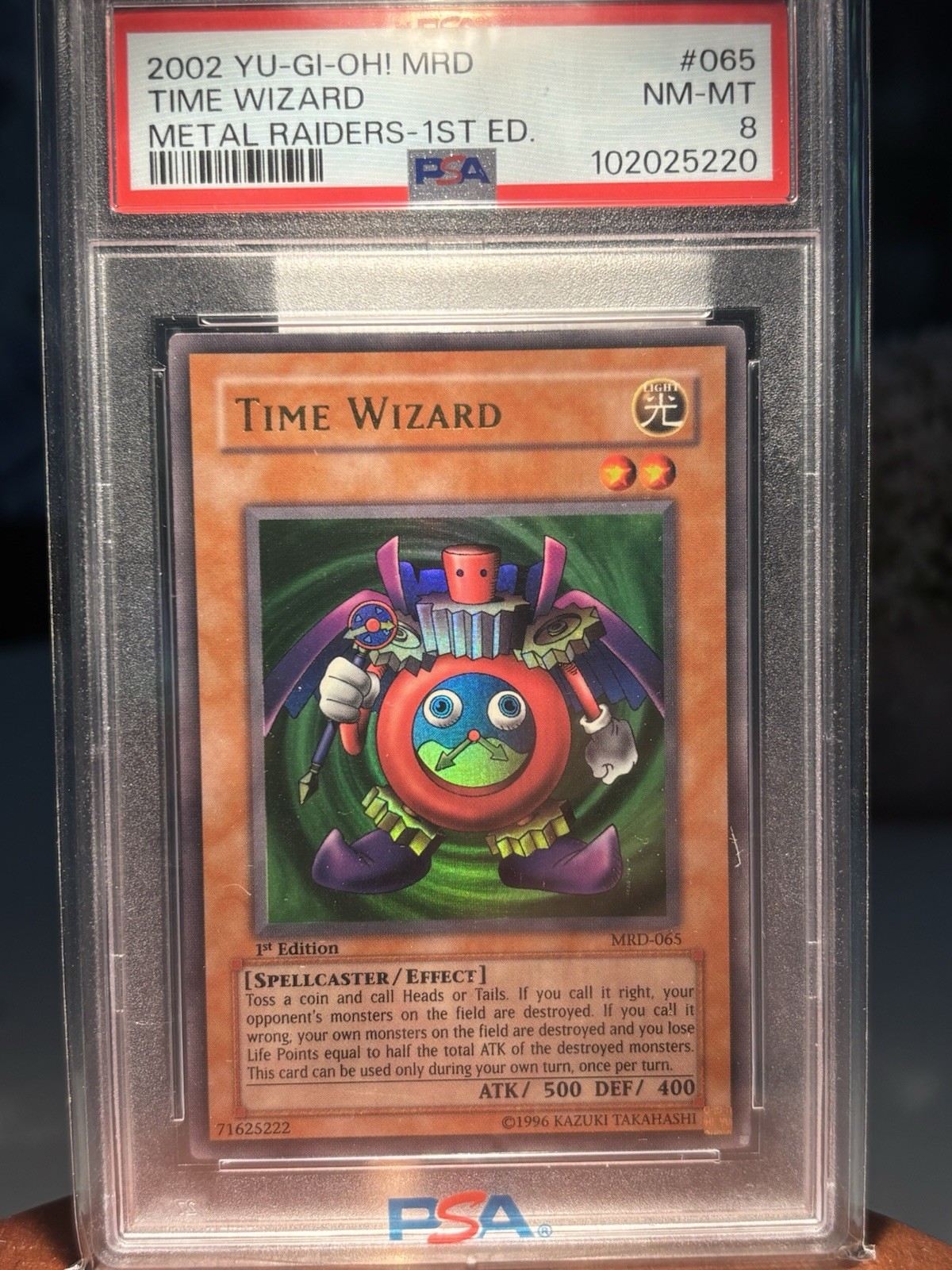 Yu-Gi-Oh! 2002 Time Wizard MRD-065 Metal Raiders 1st Edition PSA 8