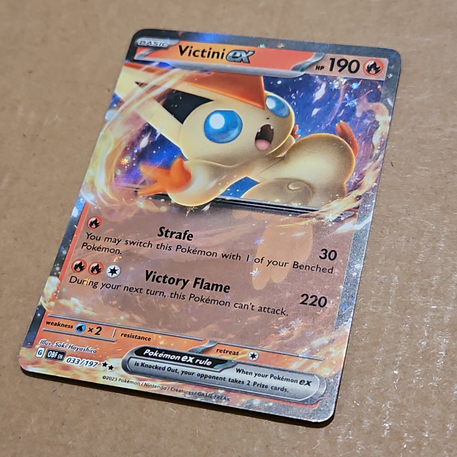 Pokemon Victini ex 033/197 SV03: Obsidian Flames Holo NM TCG CCG