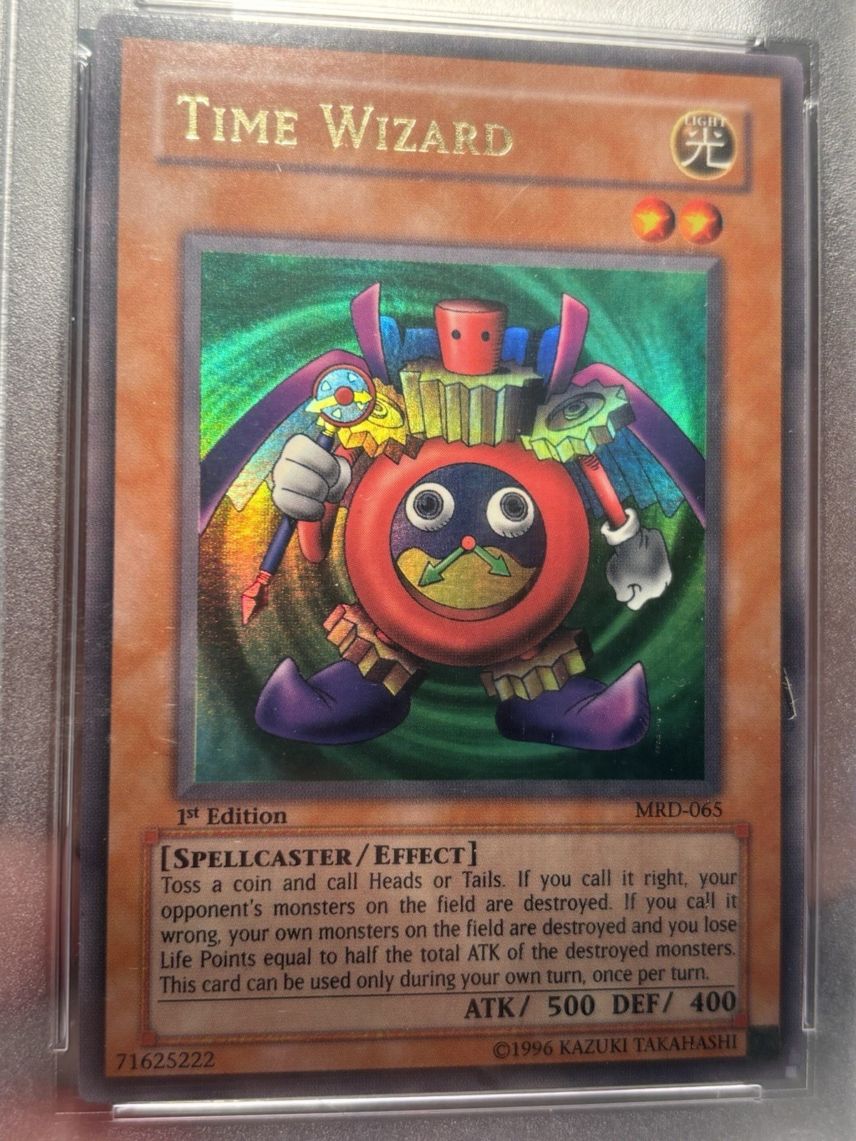 Yu-Gi-Oh! 2002 Time Wizard MRD-065 Metal Raiders 1st Edition PSA 8