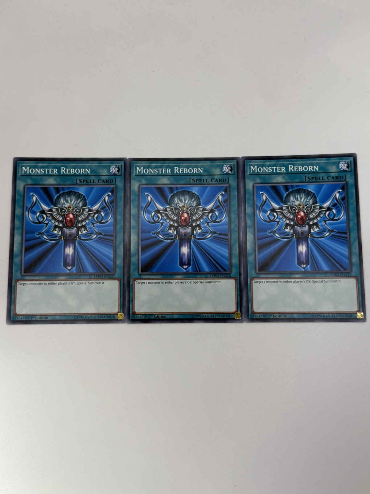 YUGIOH: 3x Monster Reborn LEHD-ENA23 YGLD-ENB16 Common 1st Edition NM
