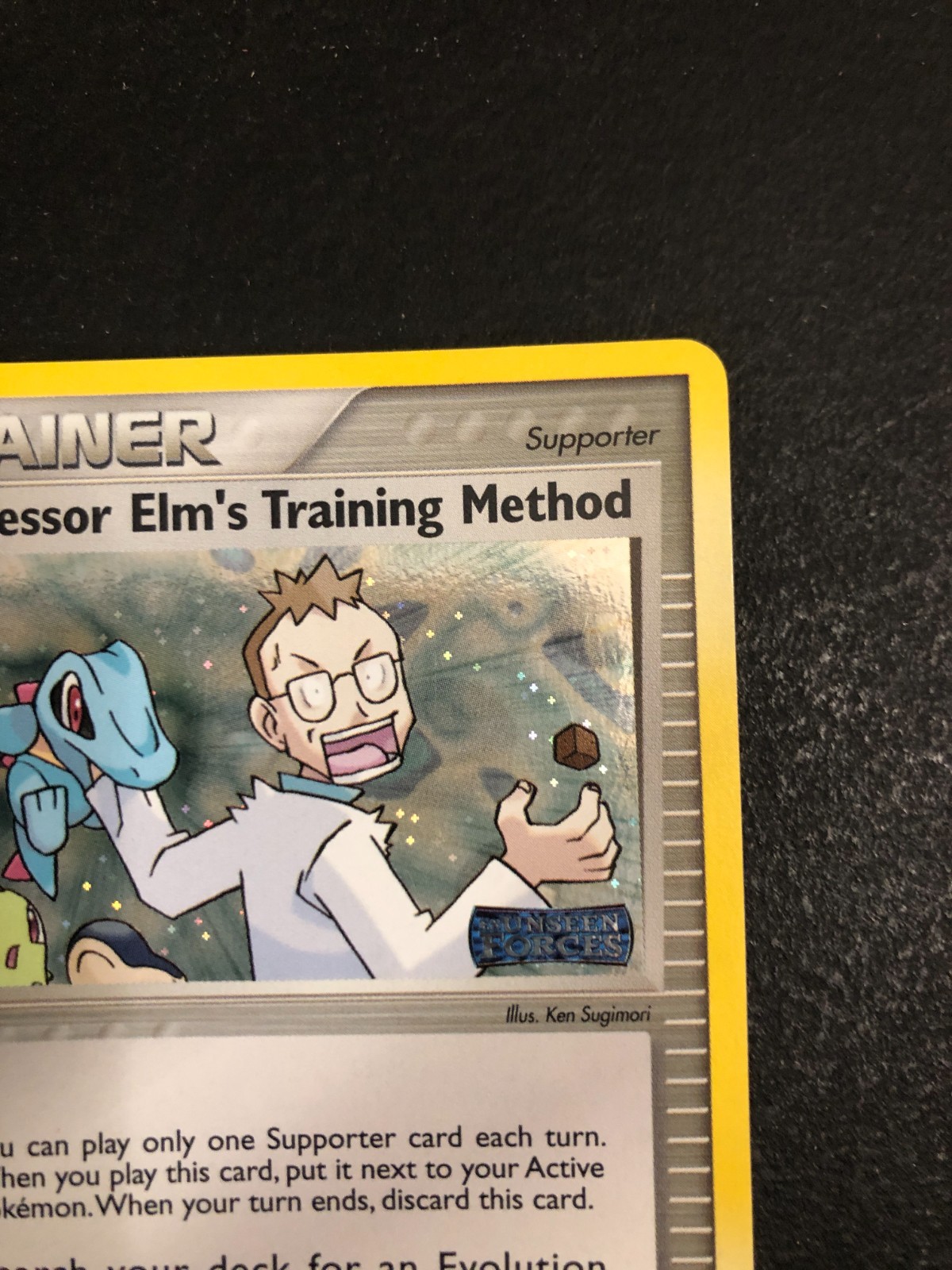 Pokémon Professor Elm’s Training Method Unseen Forces 89/115 Holo Stamped LP/NM