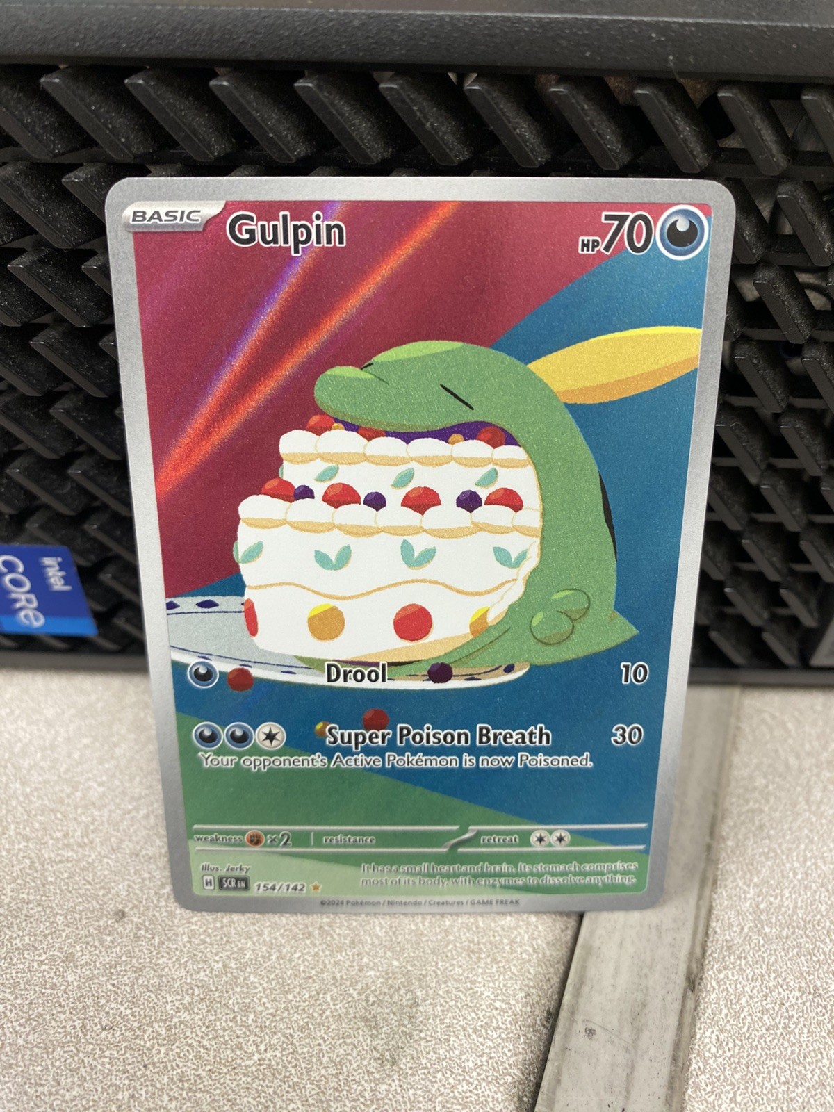 Gulpin 154/142 Holo – Pokemon SV07: Stellar Crown – NM