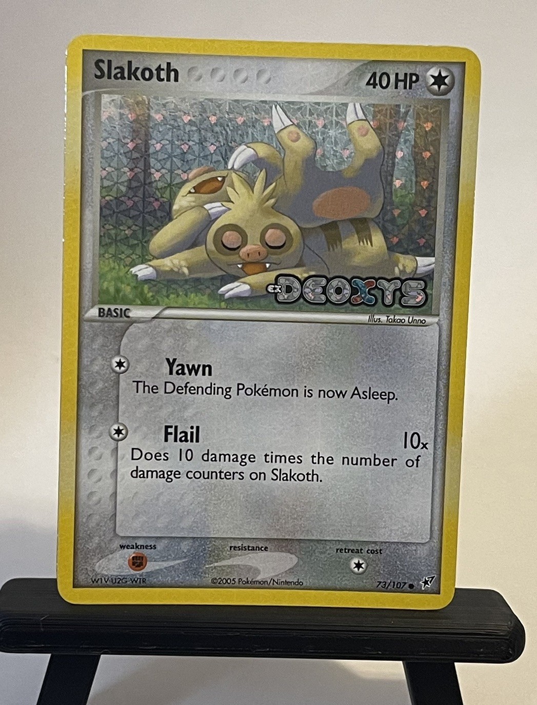 Pokemon TCG – Slakoth EX Deoxys Reverse Holo 73/107 NM (Edge Holobleed)