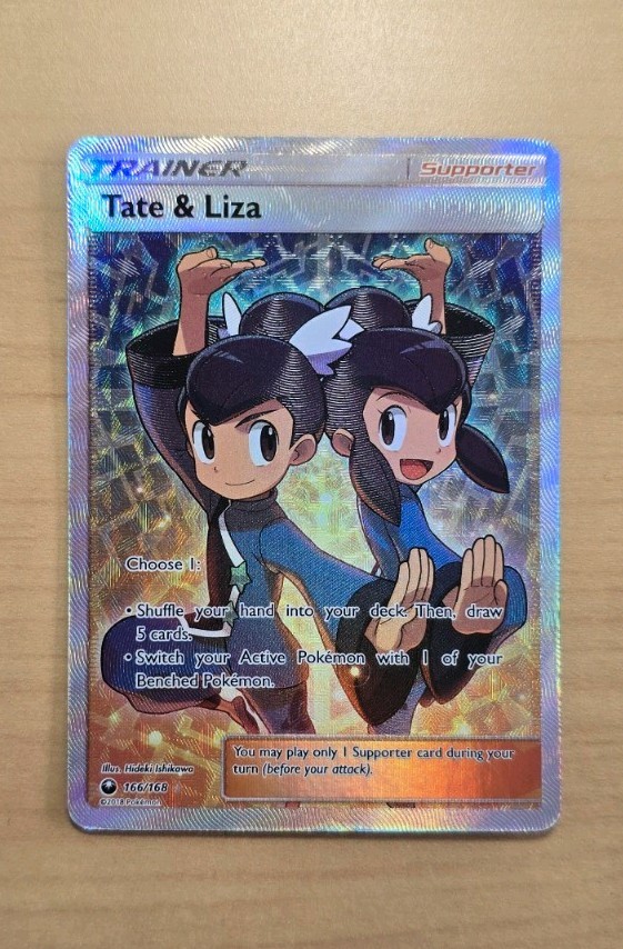 Tate & Liza (Full Art) 166/168 Sm-Celestial Storm Holo