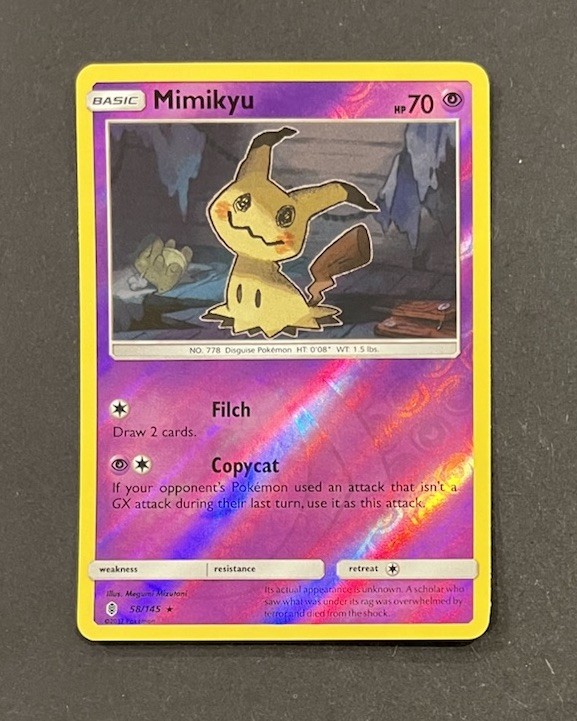 Pokemon Mimikyu 58/145 Reverse Holo Guardians Rising Near Mint