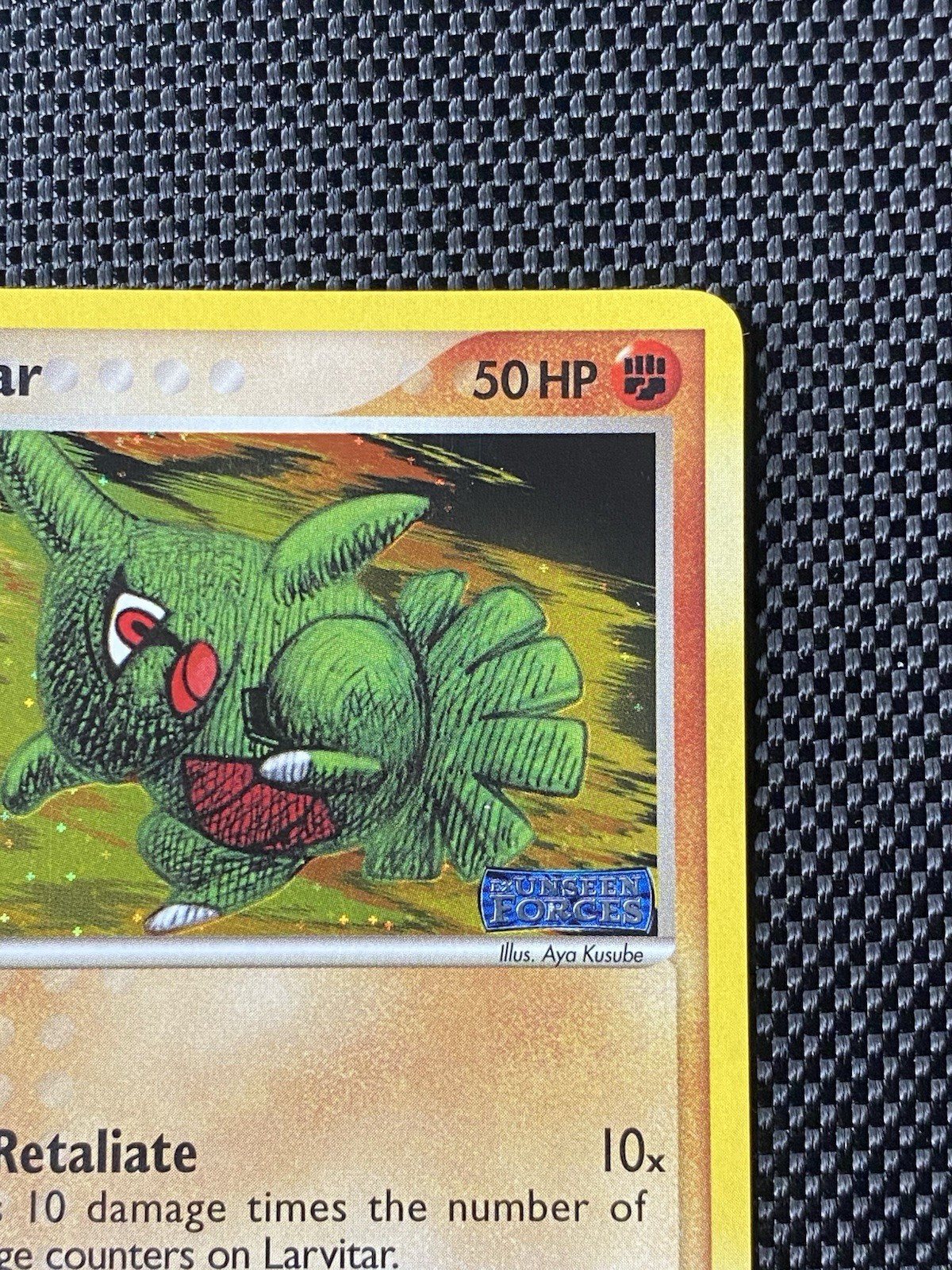 Larvitar 61/115 Unseen Forces (Stamped) Reverse Holo LP+