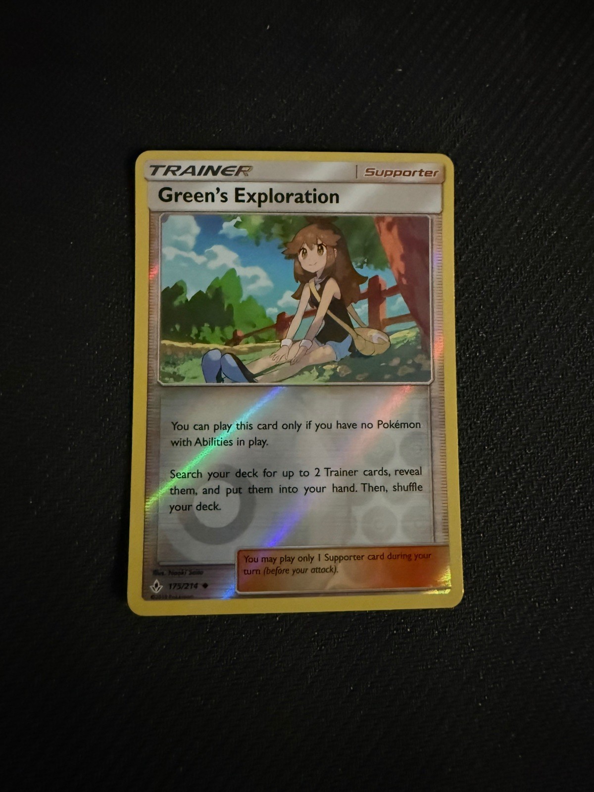 Green’s Exploration 175/214 Reverse Holo Unbroken Bonds Pokemon Card – NM