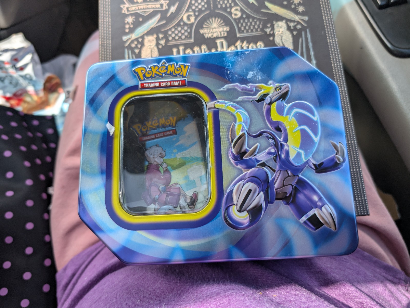 pokemon tin with 200 rare and common cards