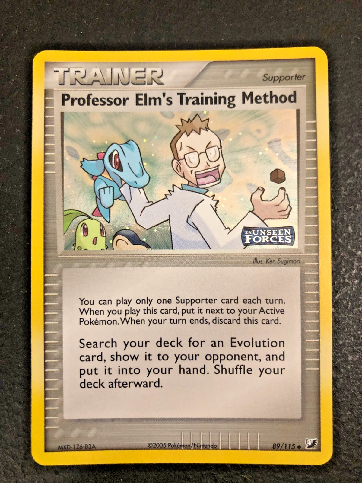 Pokémon Professor Elm’s Training Method Unseen Forces 89/115 Holo Stamped LP/NM