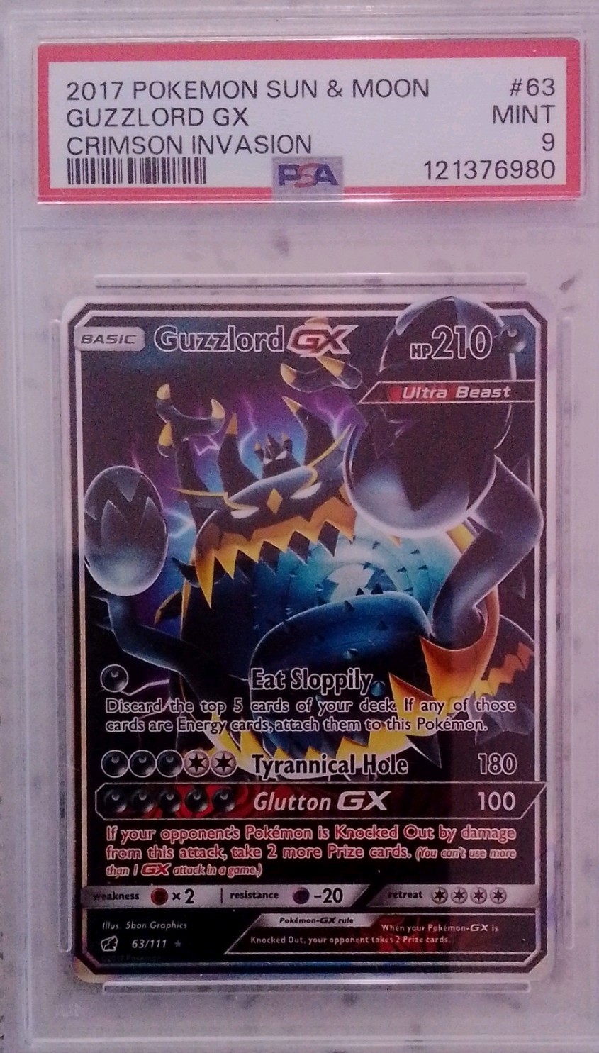 Guzzlord GX 63/111 Sm-Crimson Invasion Holo