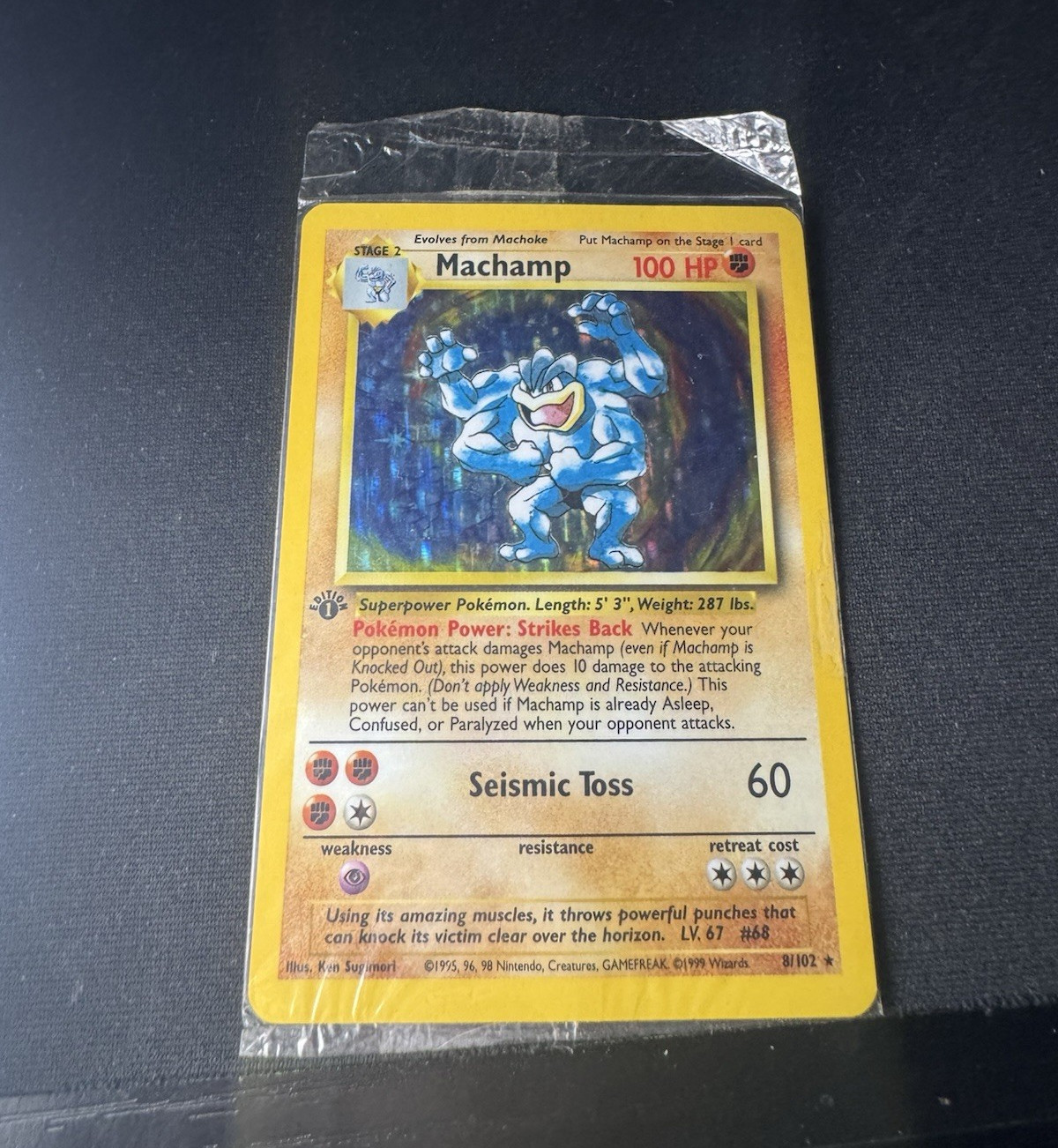 1st edition Machamp Base Set Holo Rare still in original plastic wrap!