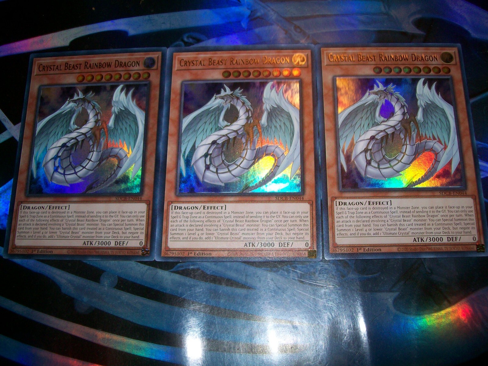 3x Crystal Beast Rainbow Dragon 1st Edition Ultra Rare SDCB-EN044 Yu-Gi-Oh!