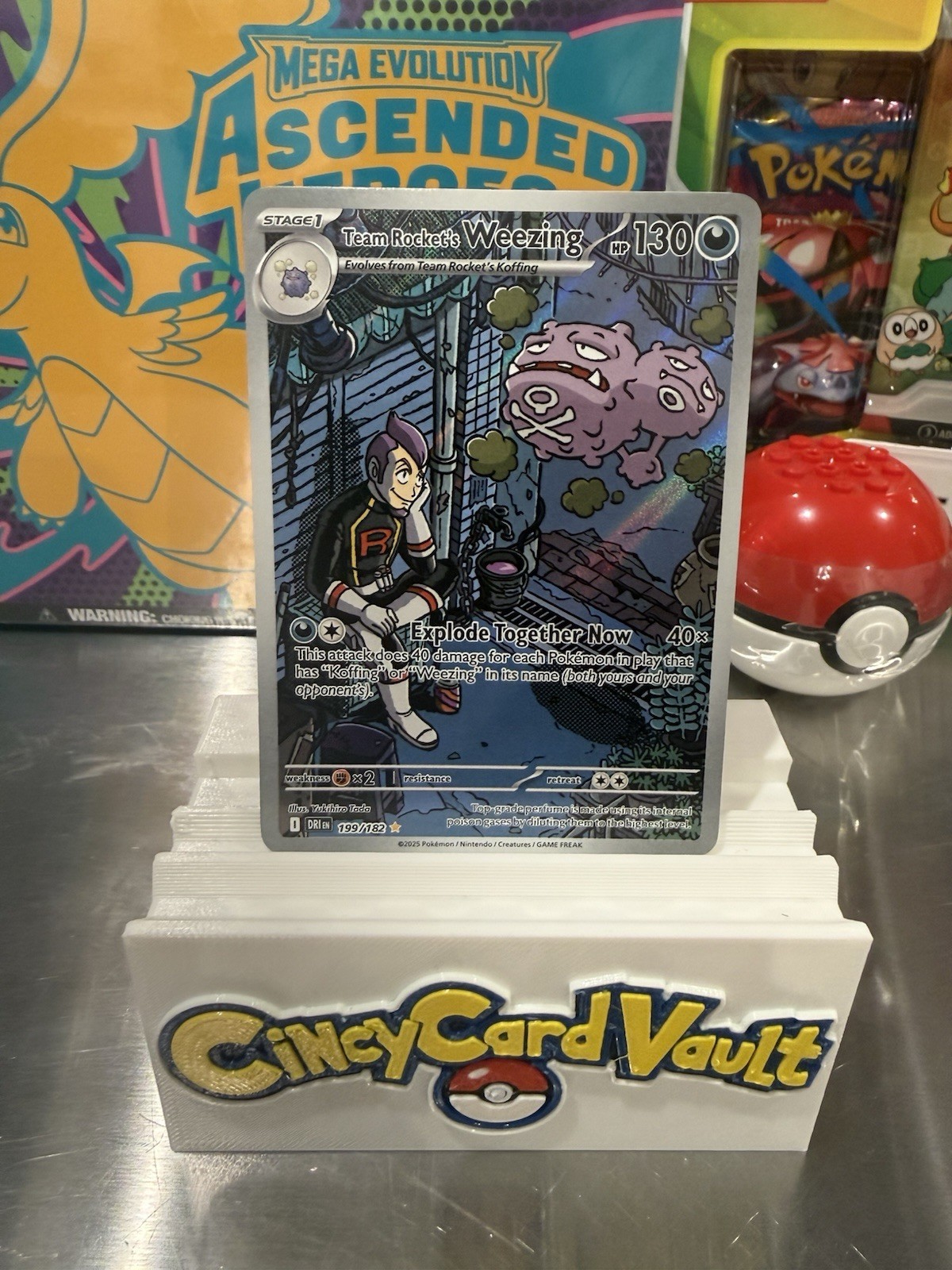The Pokémon Company Team Rocket’s Weezing 199/182 SV10 IR Holo EN 2025 130HP