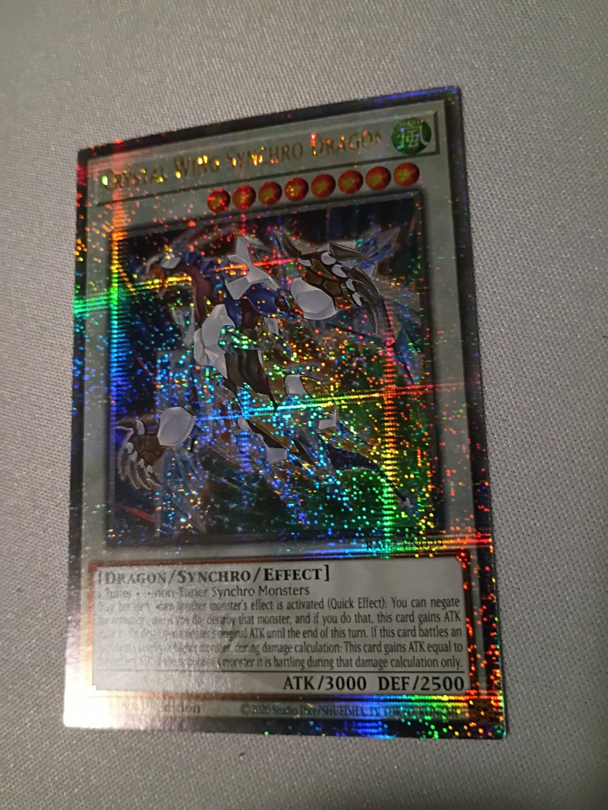 Crystal Wing Synchro Dragon (Quarter Century Secret Rare) RA02-EN029 Yu-Gi-Oh NM