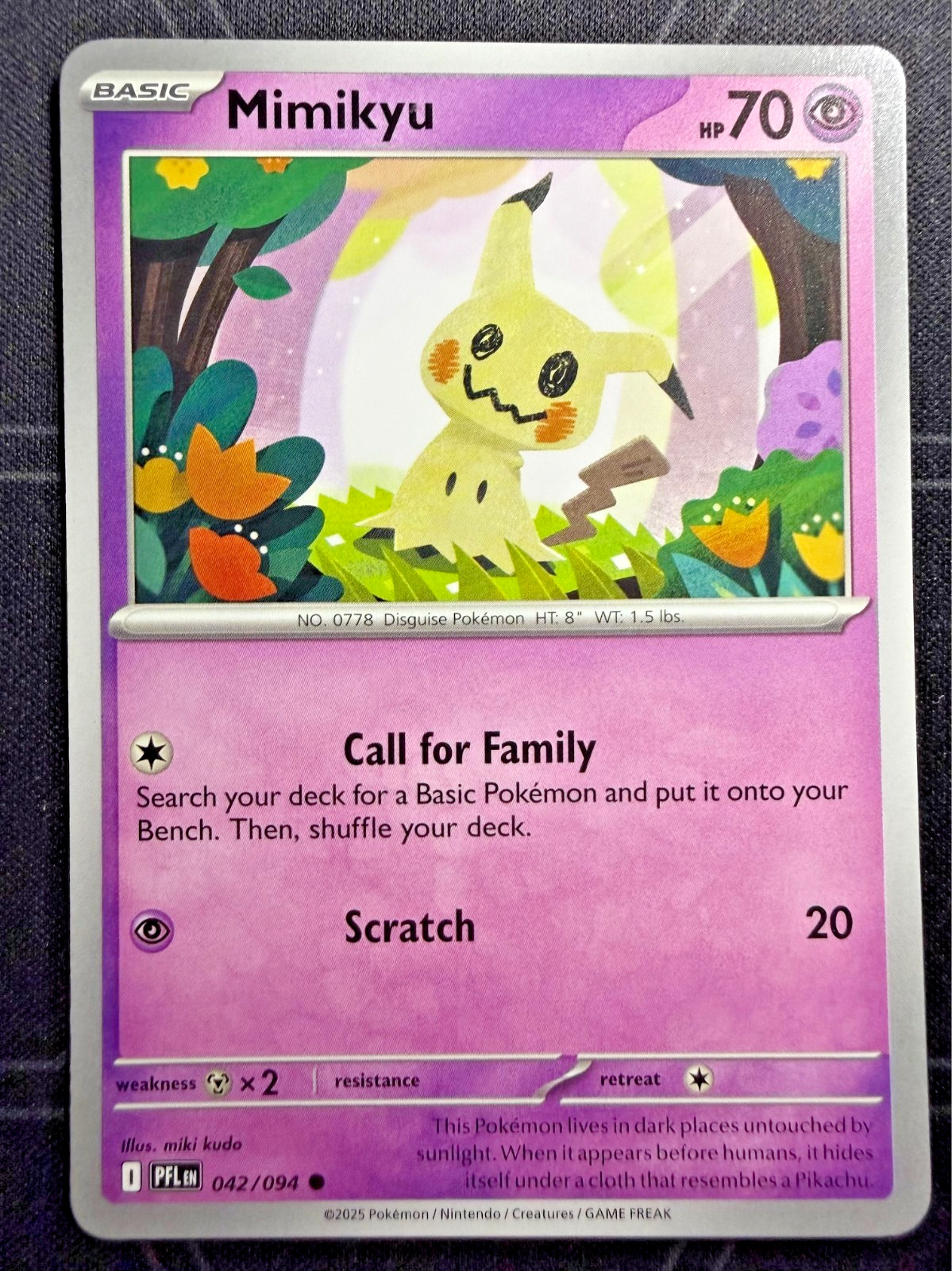 Mimikyu 042/094 Me02: Phantasmal Flames Regular