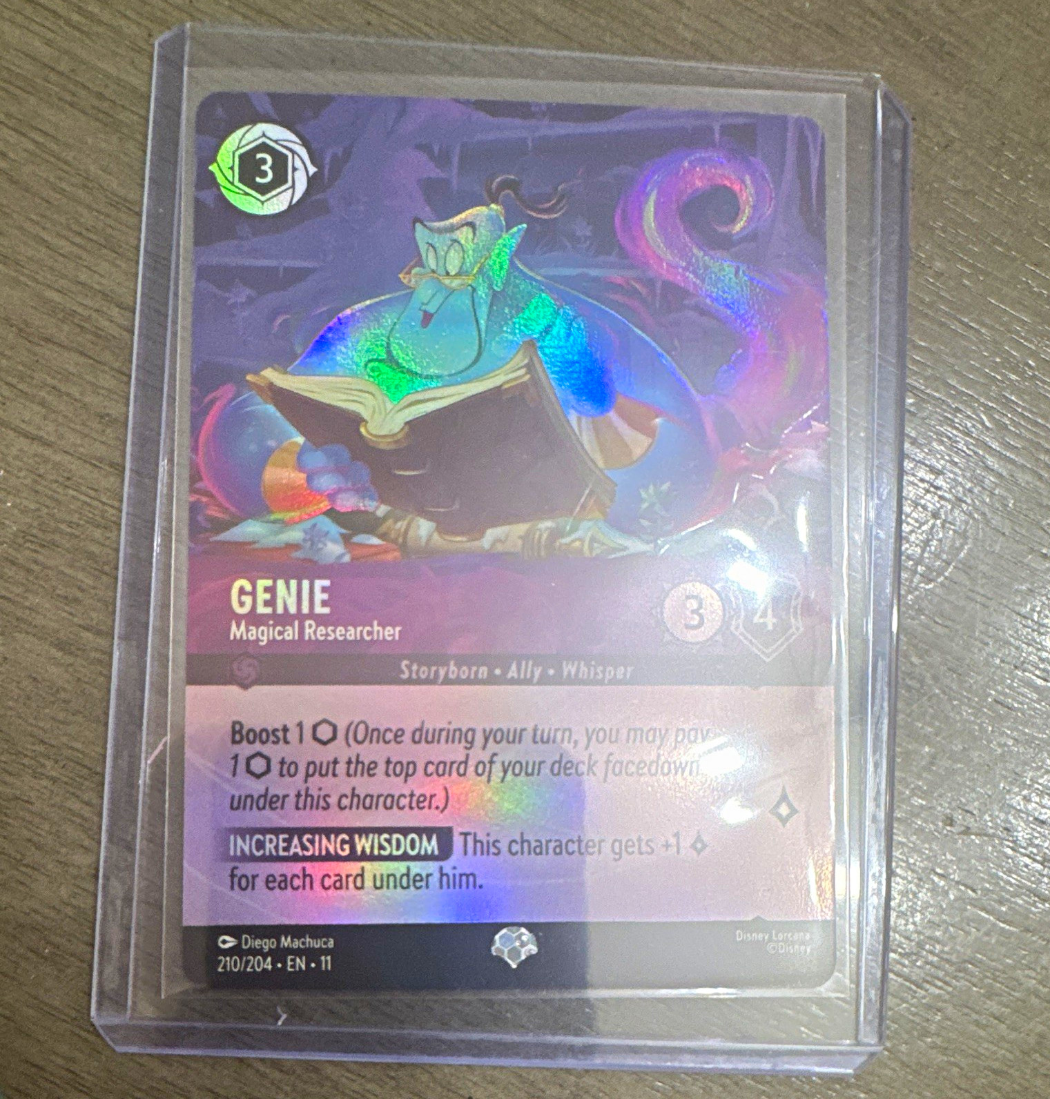 Disney Lorcana Genie – Magical Researcher 210/204 Epic Foil EN-11