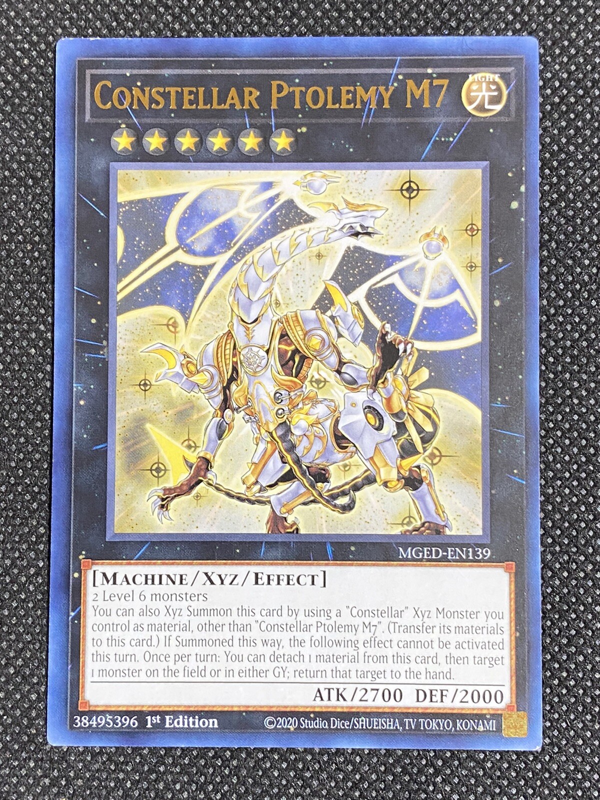 YuGiOh! – Constellar Ptolemy M7 MGED-EN139 Gold Rare 1st Edition Lightly Played