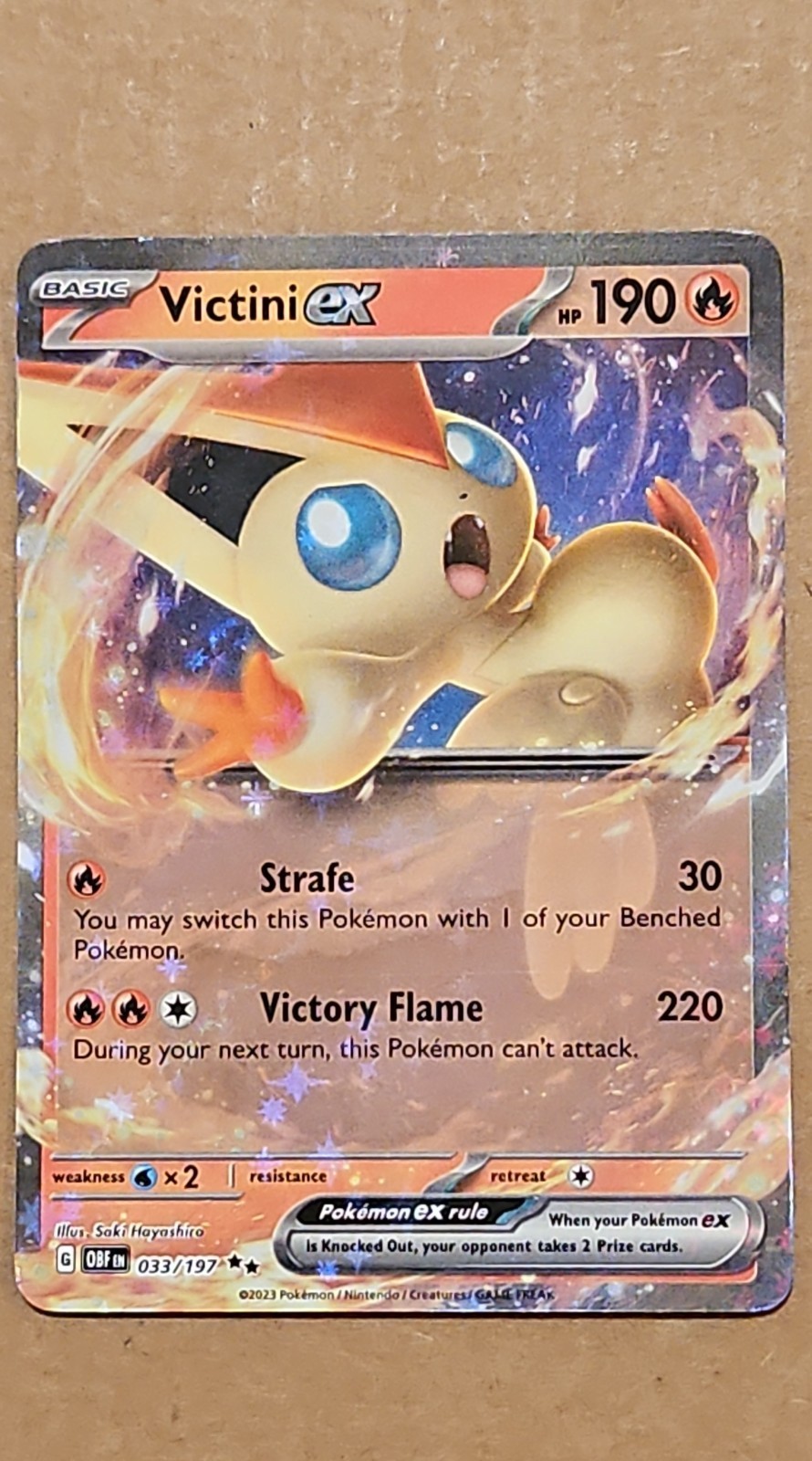 Pokemon Victini ex 033/197 SV03: Obsidian Flames Holo NM TCG CCG