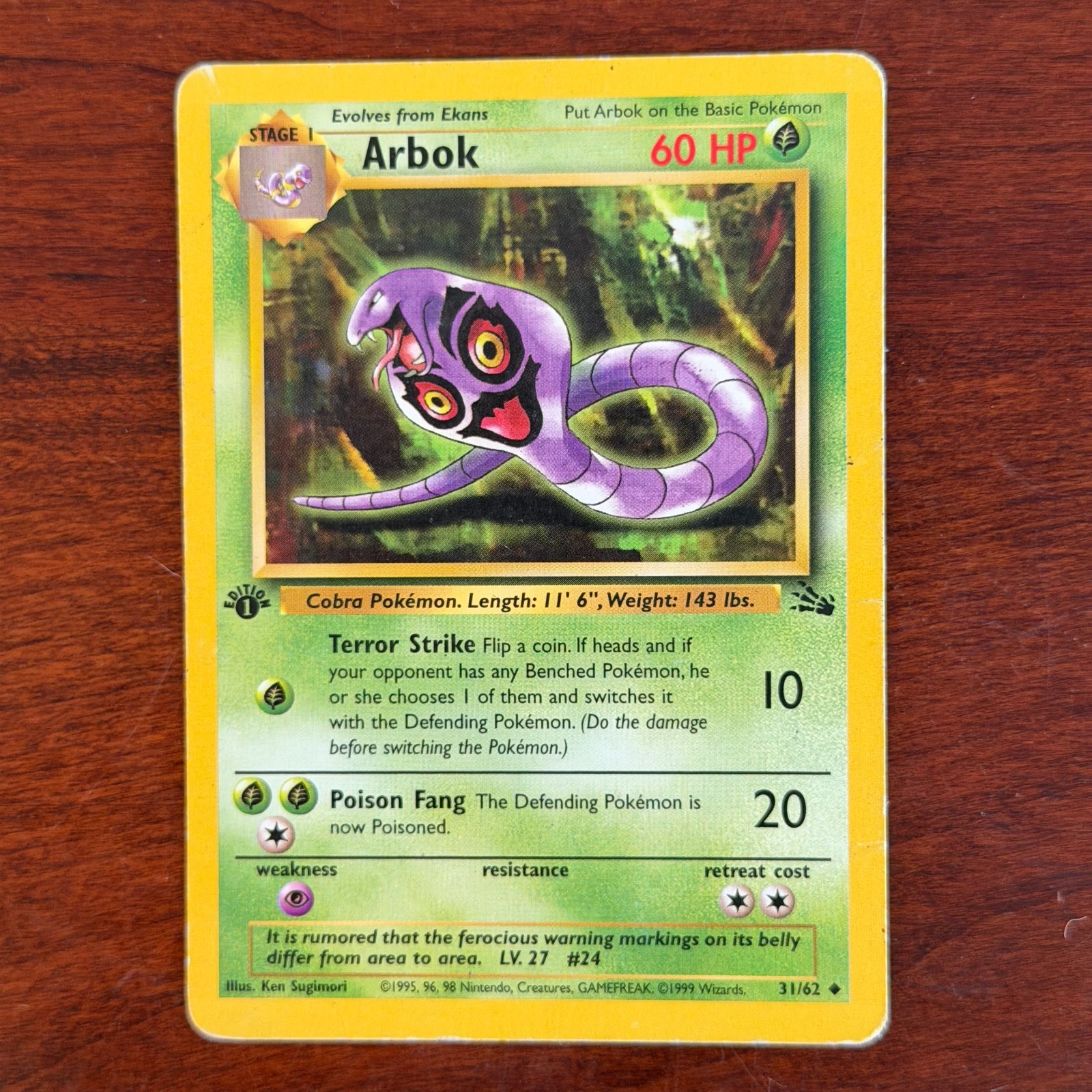 1st Edition Arbok 31/62 Uncommon Fossil Pokemon Card DMG