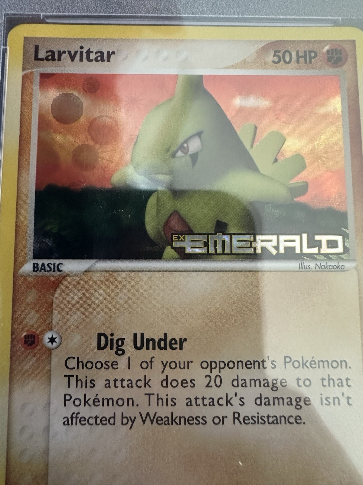 Larvitar 52/106 Emerald Reverse Holo PSA 9
