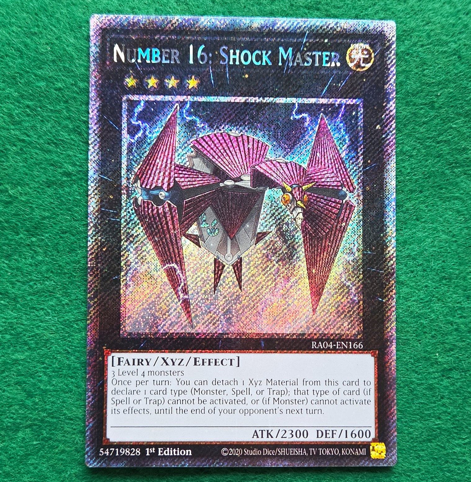 Konami Number 16: Shock Master RA04-EN166 Plat Secret Holo 1st Eng 2300/1600