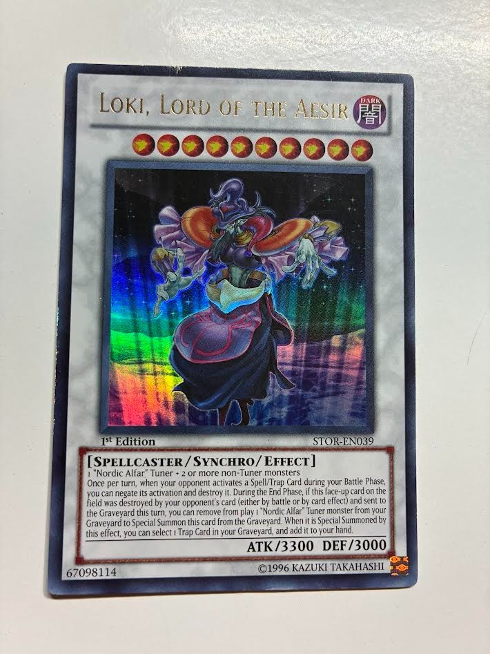USA Seller Yugioh Loki, Lord of the Aesir Ultra Rare 1st Edition STOR-EN039 LP