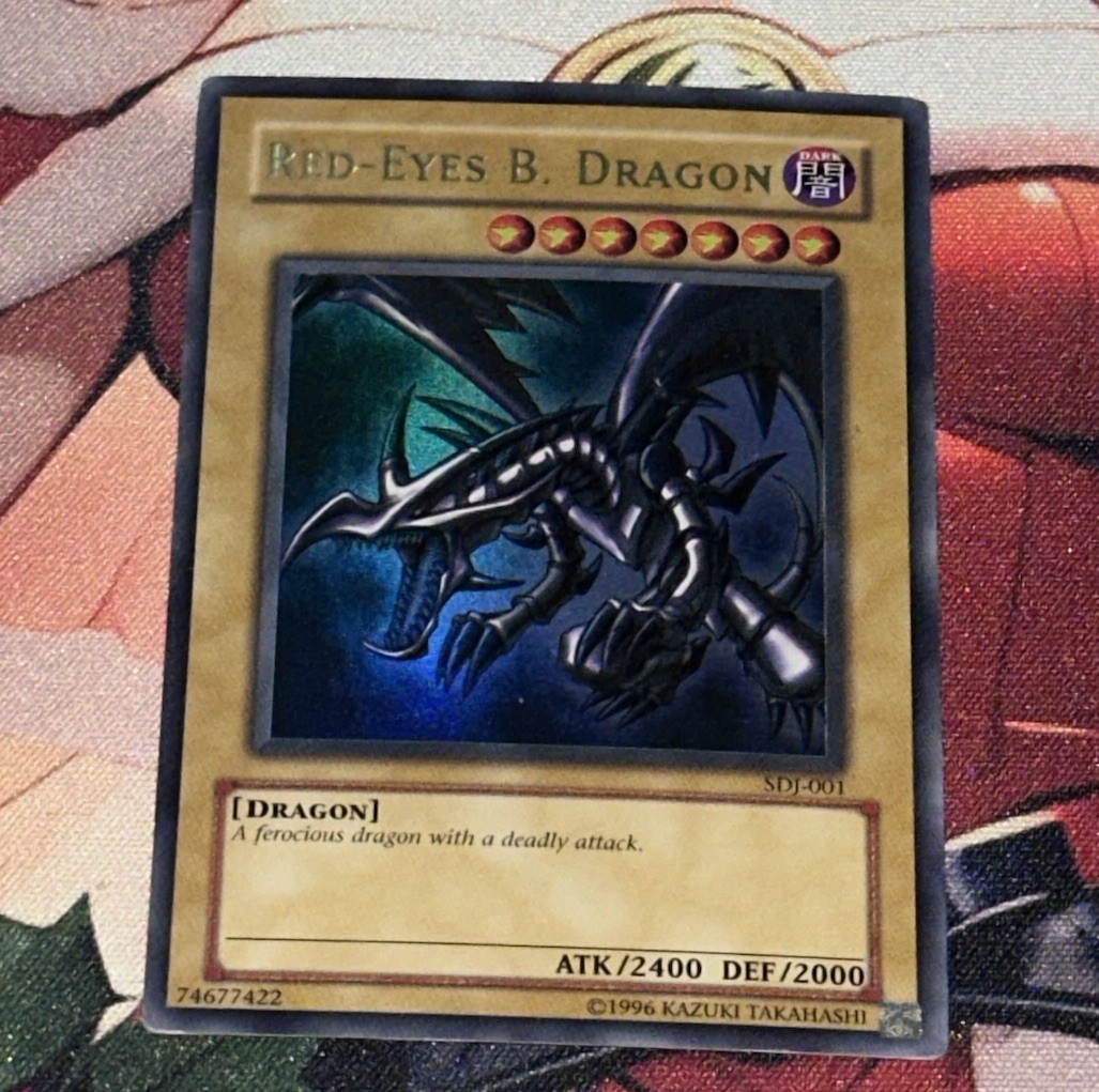 Yu-Gi-Oh! TCG Red-Eyes Black Dragon SDJ-001 Vintage Holo Rare Card 1996